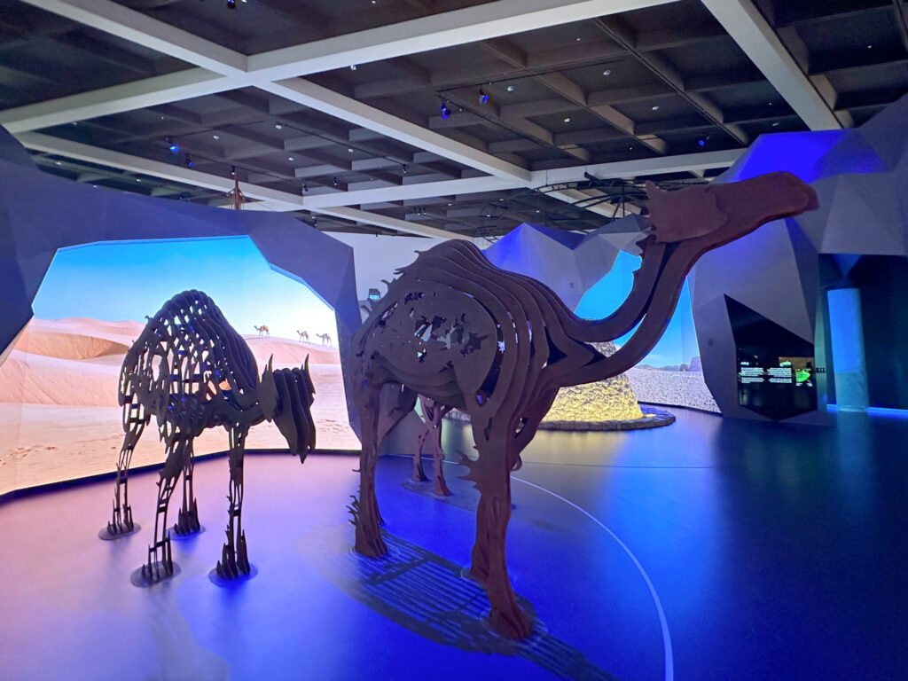 Three camels made of metal