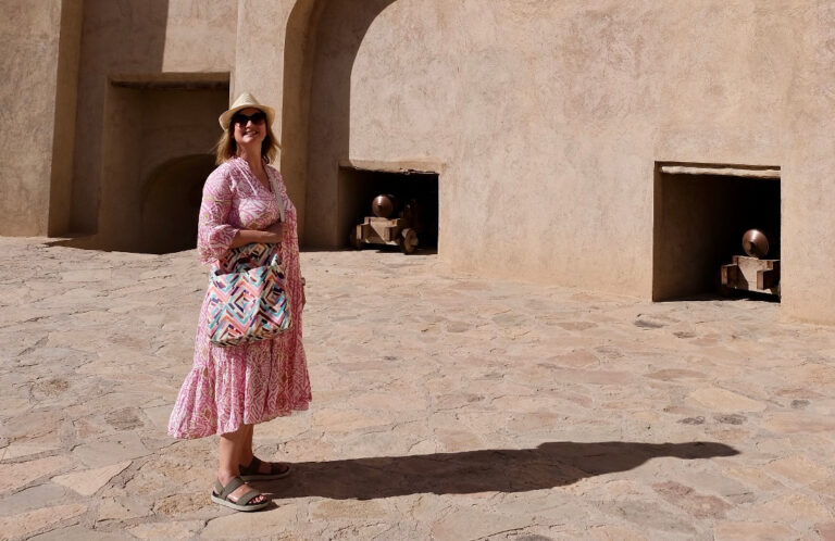 Claire looking up at Nizwa Fort