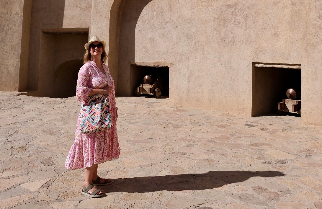 Claire looking up at Nizwa Fort