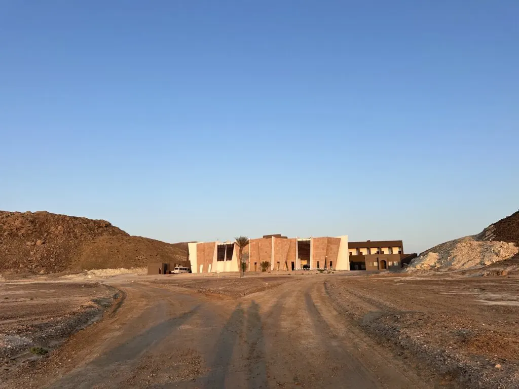 The back of the Ras Al Jinz Turtle Reserve visitor centre at sunrise