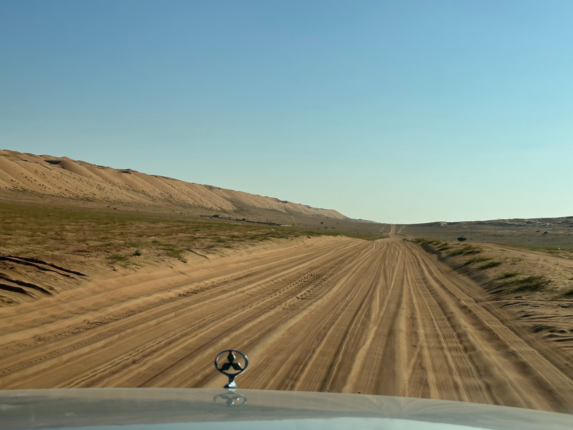 A Bedouin road in the Wahiba Sands desert in Oman