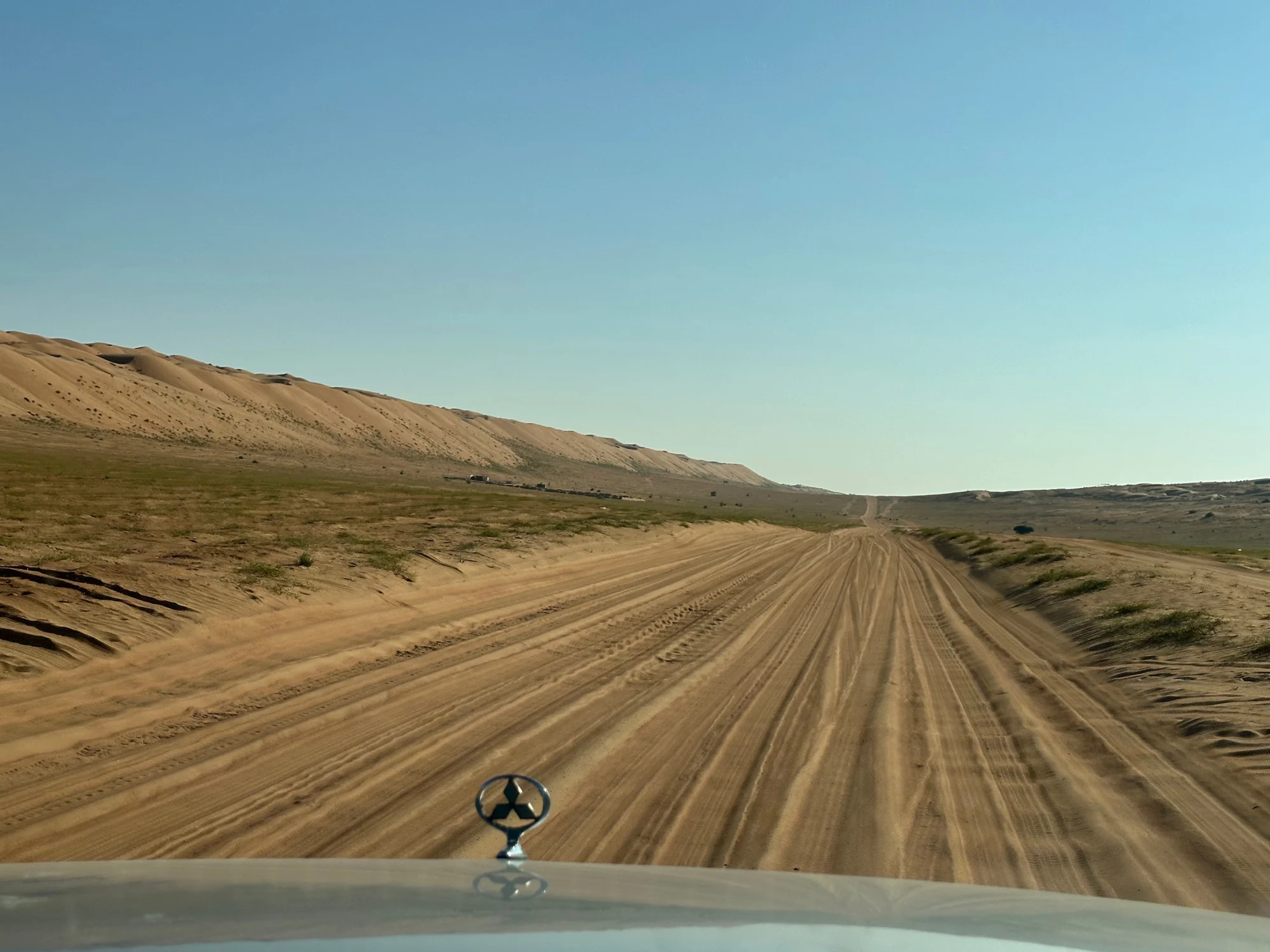 A Bedouin road in the Wahiba Sands desert in Oman
