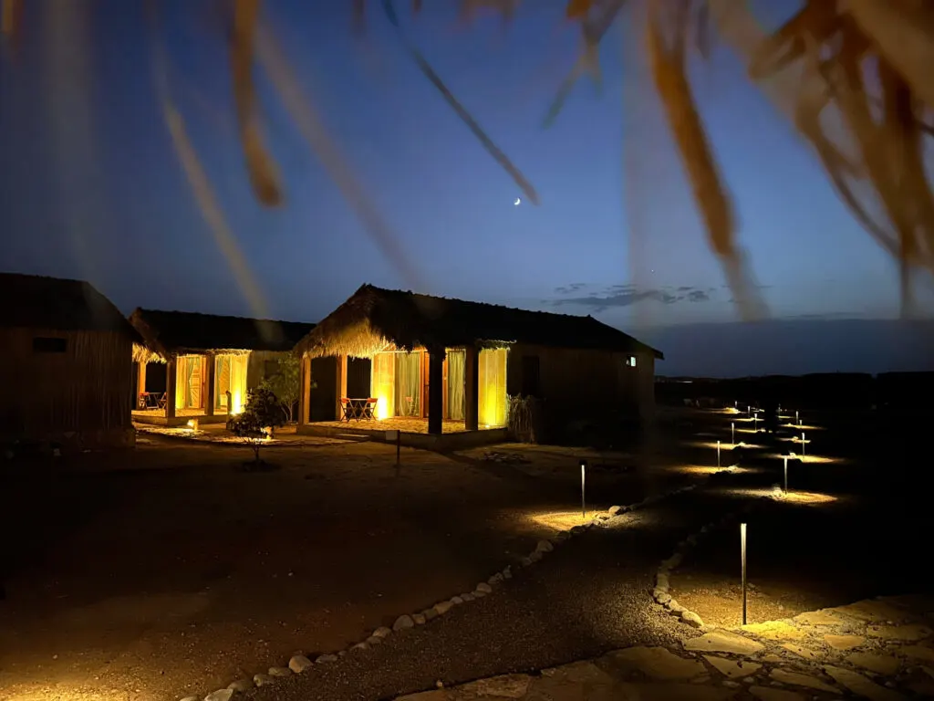 SAMA Ras al Jinz resort's eco lodges at night