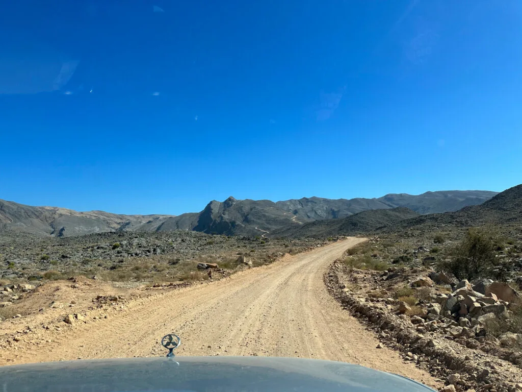 A dirt track across the Salmah Plateau in there Eastern Hajar Mountains in Oman