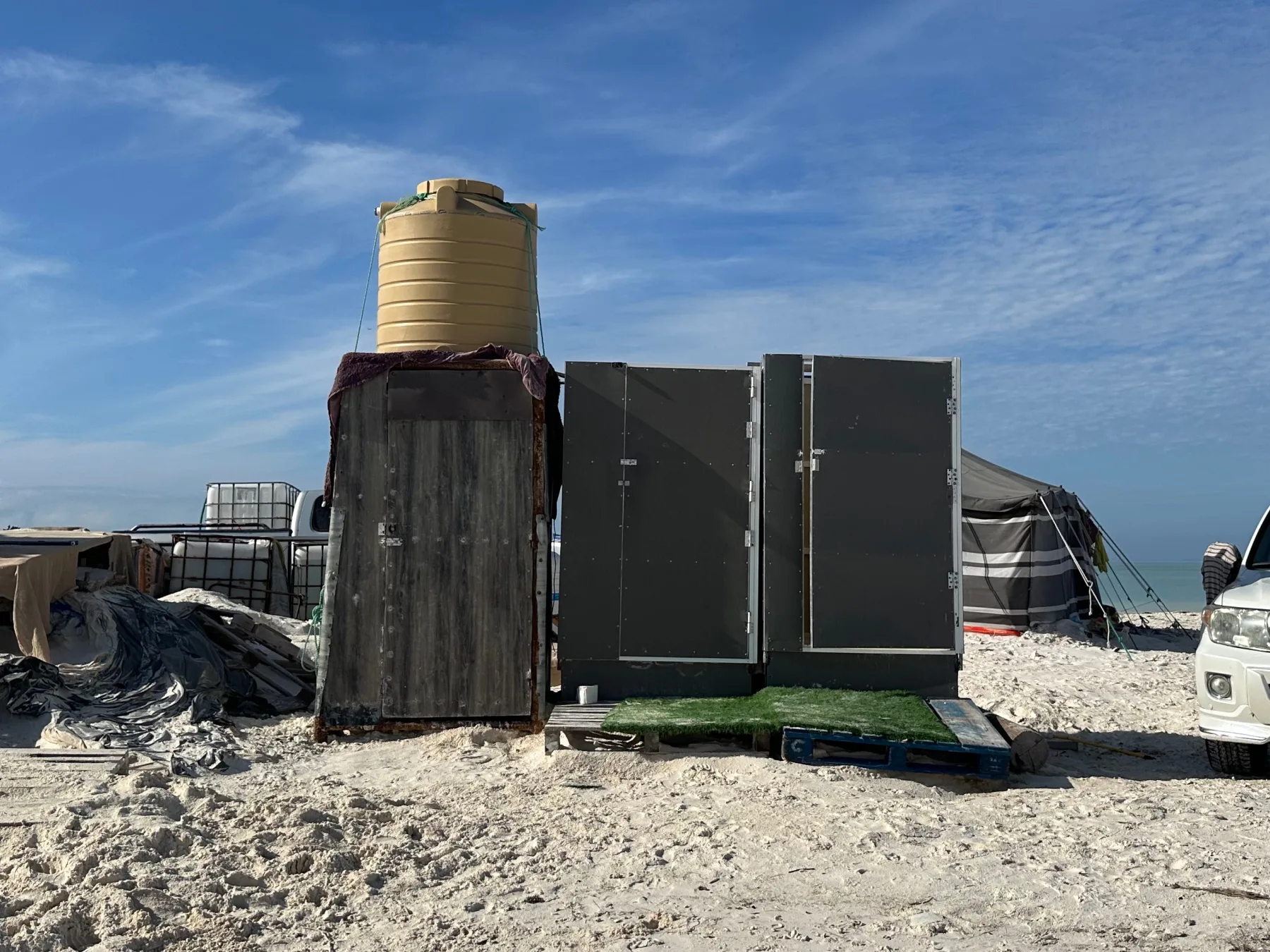 Outdoor toilet and shower cubicles on the beach