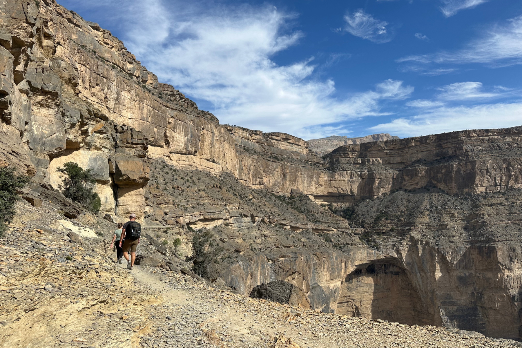A view from the Balcony Walk path towards the abandoned village of AsAb below the cliffs of the canyon