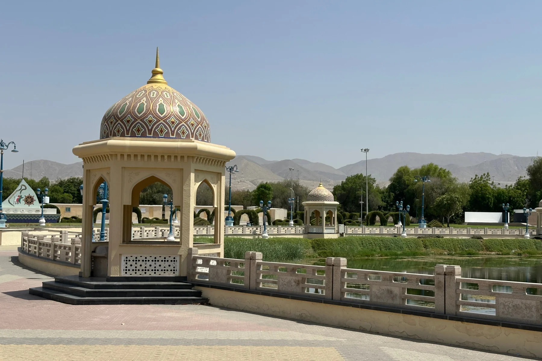 Domed shelter beside the lake in Qurum Park
