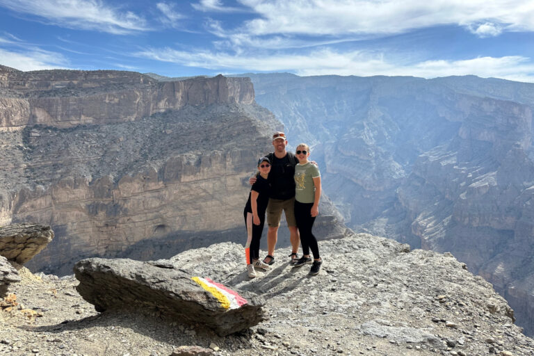 My family stood at a view point on the Balcony Walk behind them Al Nakhur Canyon