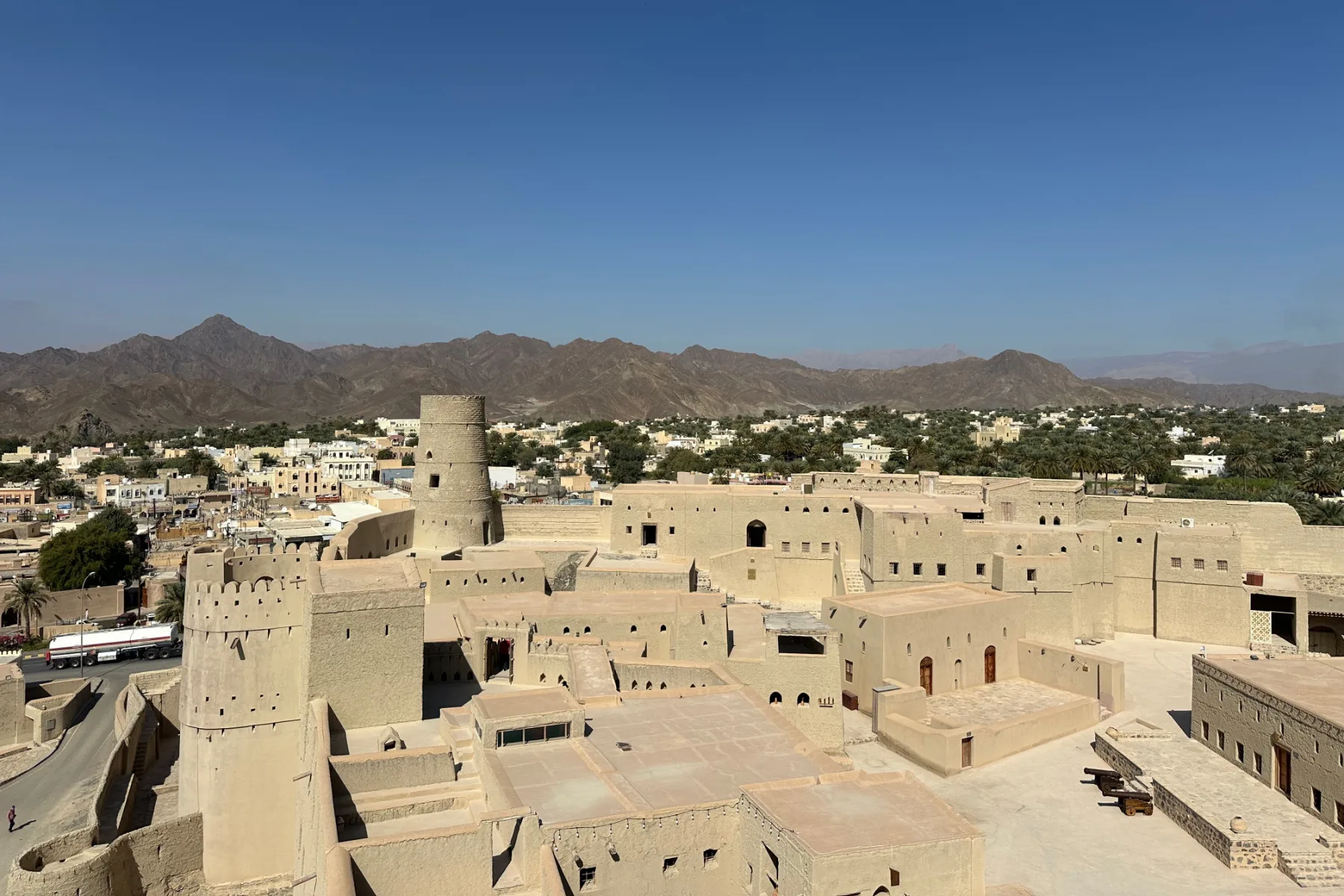 A view one the to of Bahla Fort towards the Hajar Mountains
