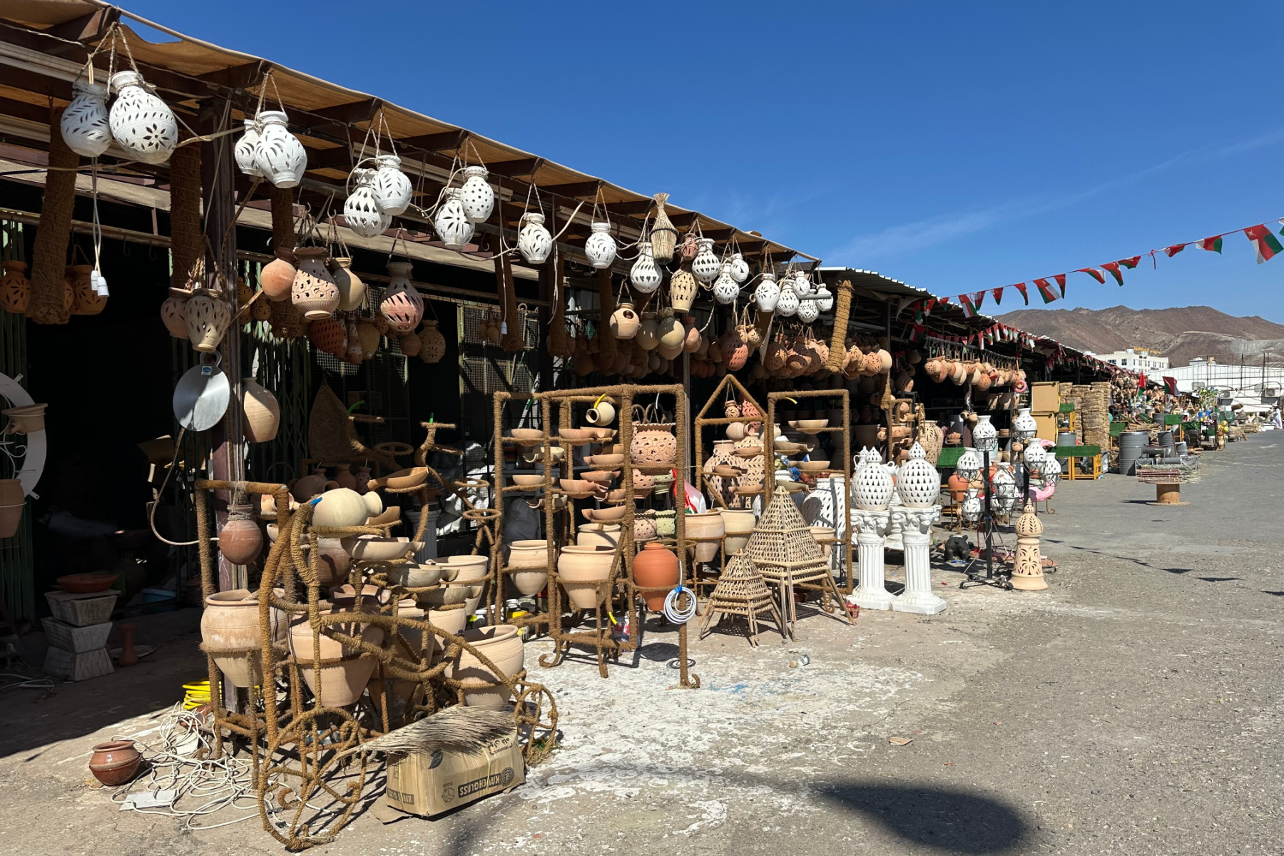 Rows of shops selling pottery in Fanja