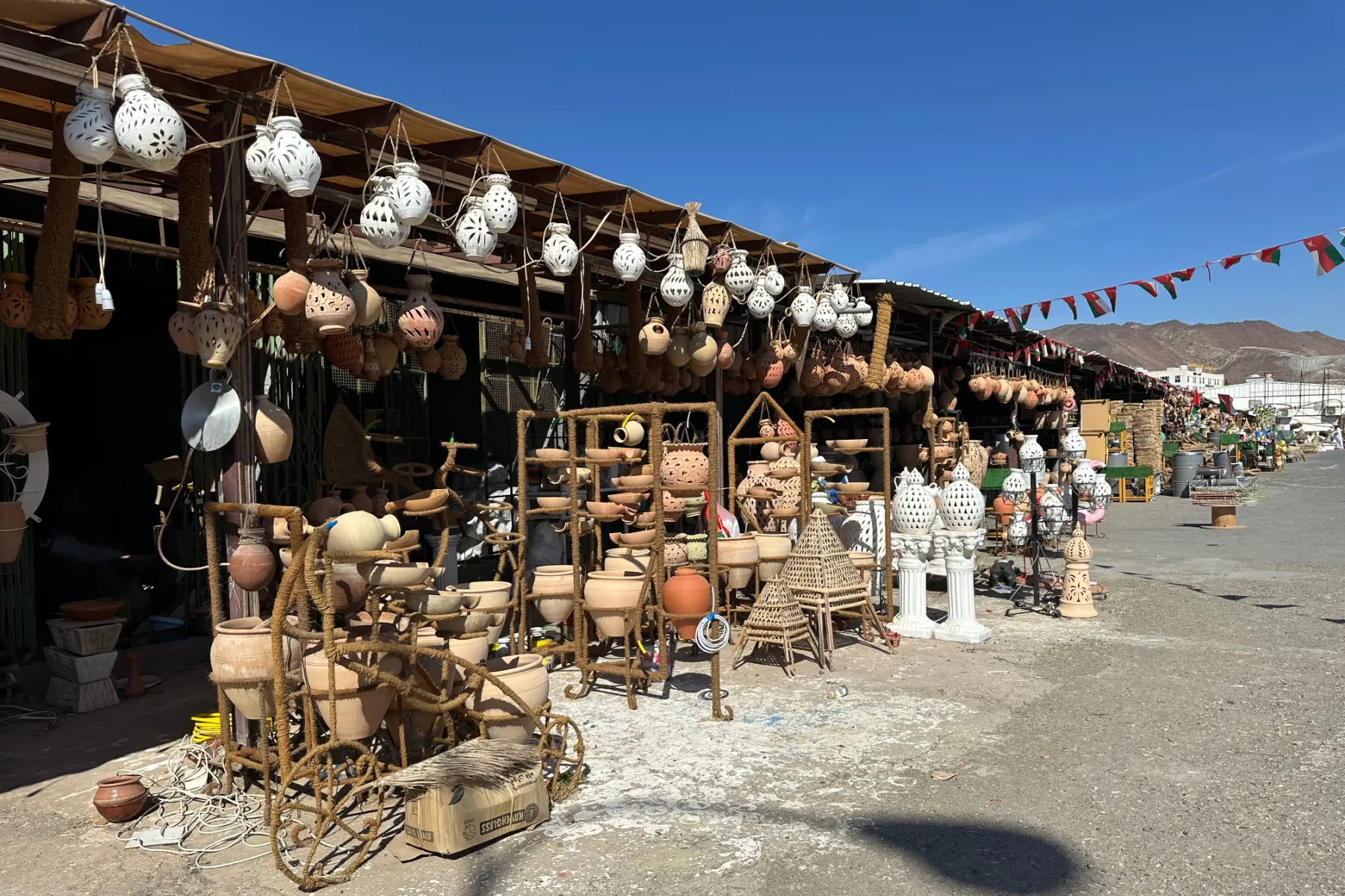 Rows of shops selling pottery in Fanja