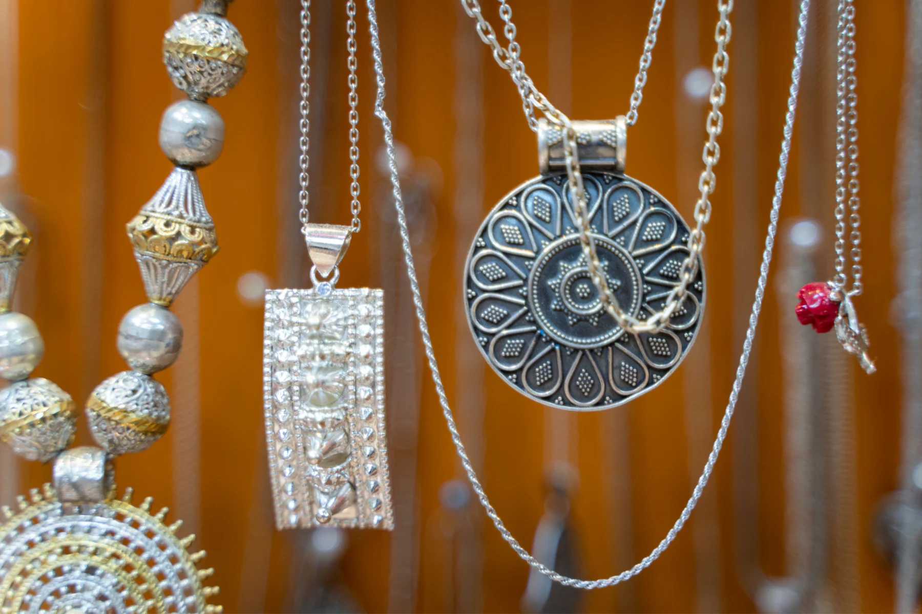 Omani silver jewellery hanging in a shop