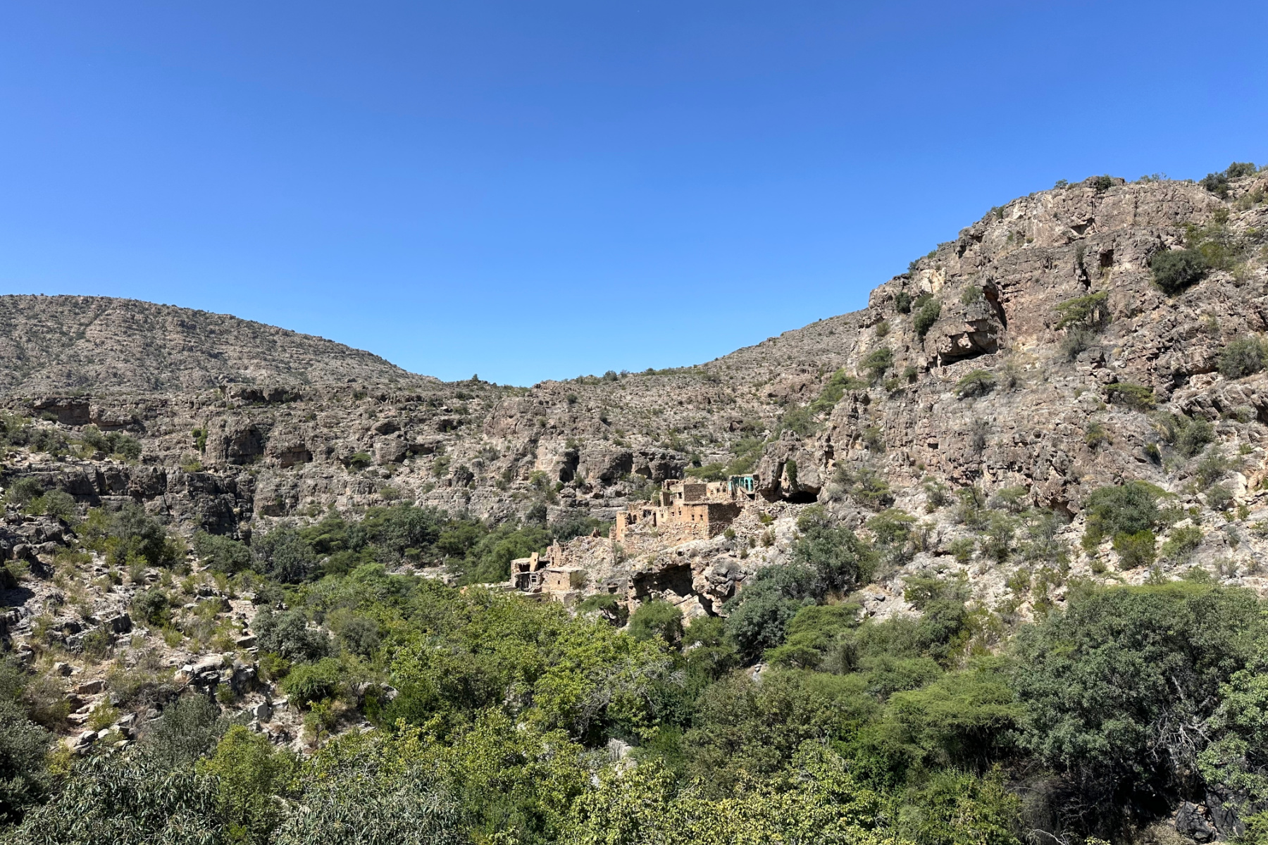 A view of abandoned homes of Bani Habib on the side of a valley on Jebel Akhdar