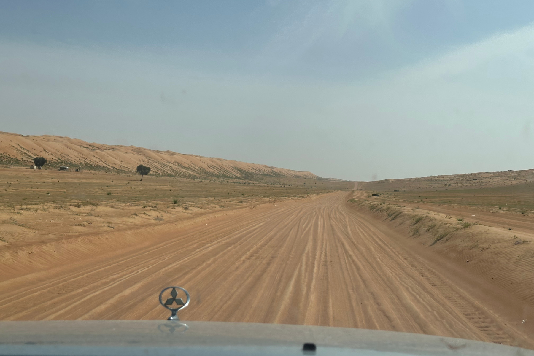 A view out the front window of our Pajero as we drive the Bedouin road into the desert from Al Wasil