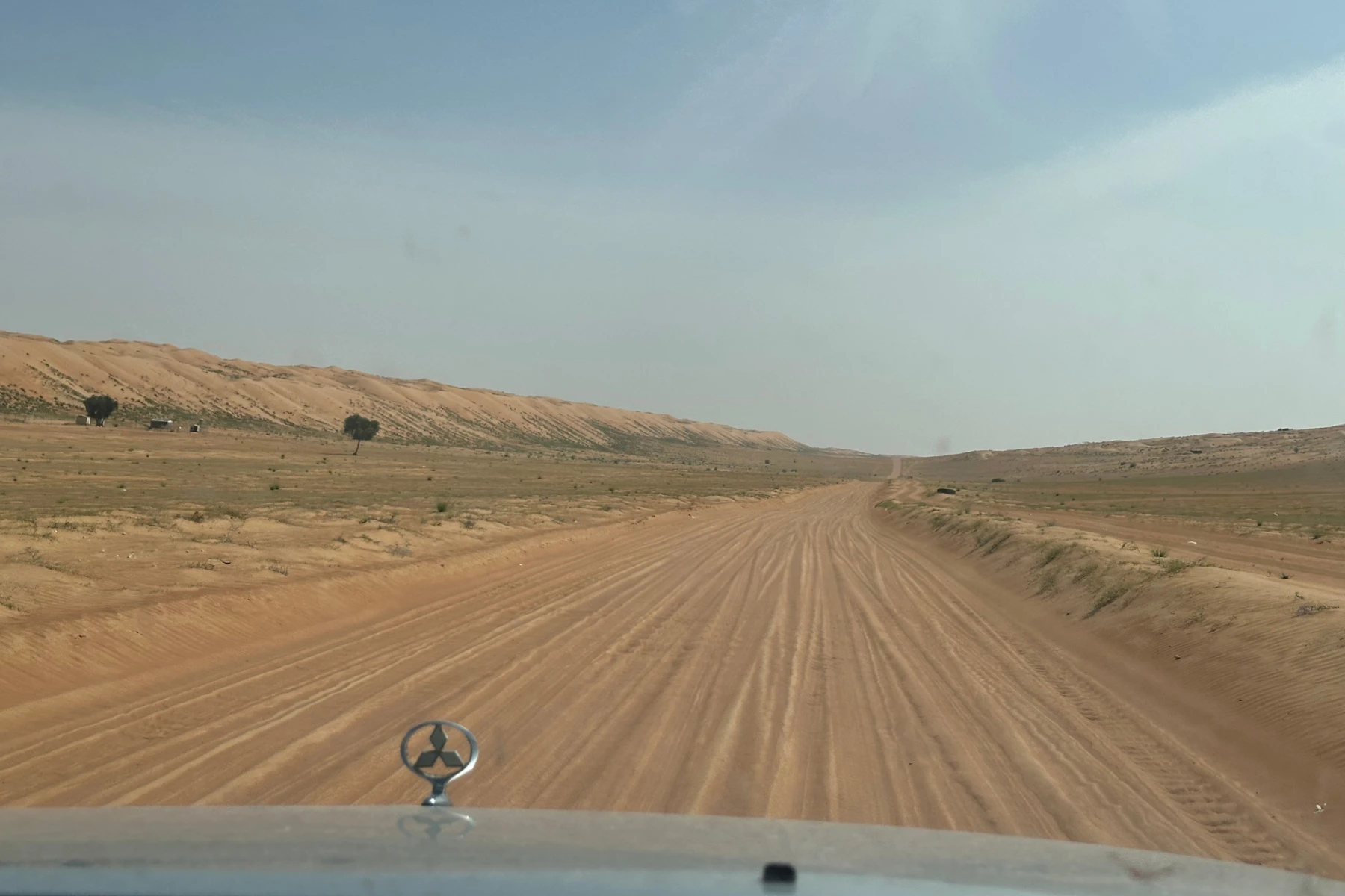 A view out the front window of our Pajero as we drive the Bedouin road into the desert from Al Wasil
