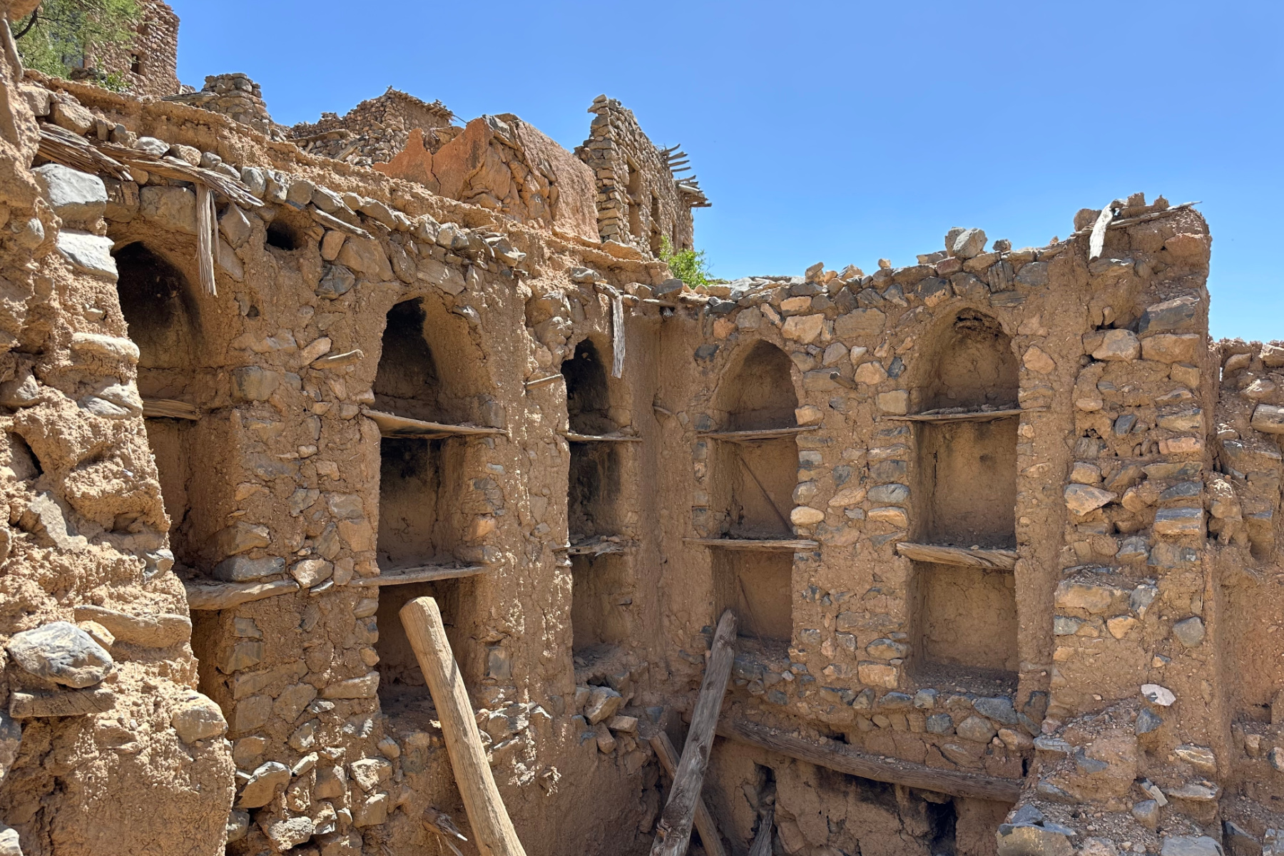 The interior of a home in Wadi Bani Habib. The exterior walls and roof have fallen down