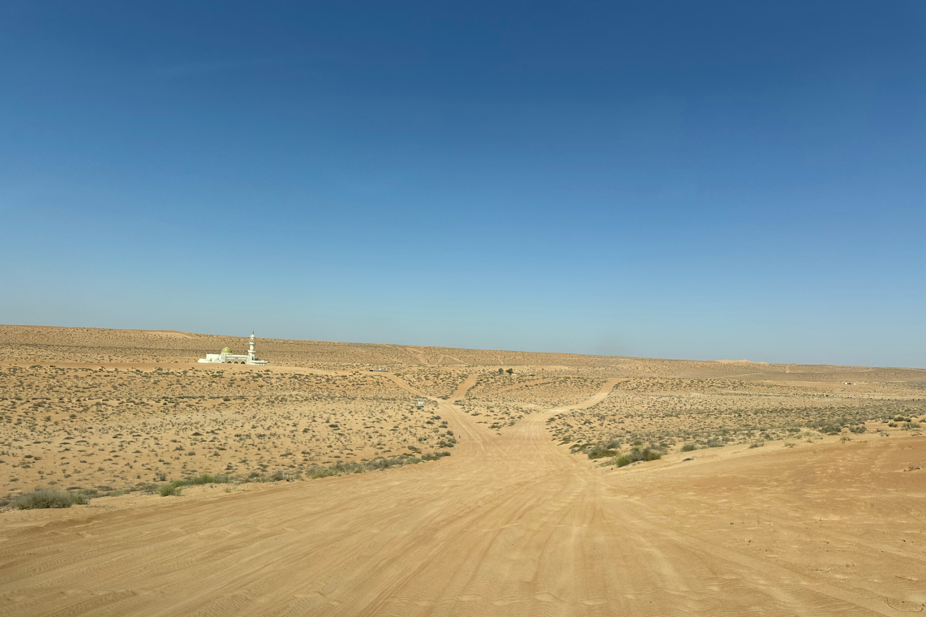 Driving towards the mosque in a remote part of the desert