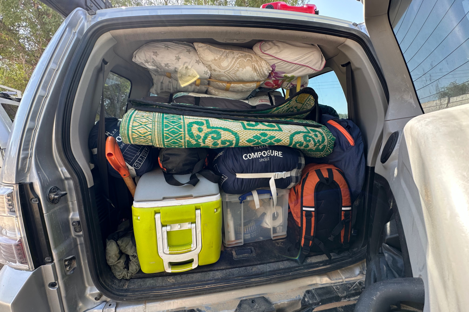 Camping gear backed in the back of a Pajero