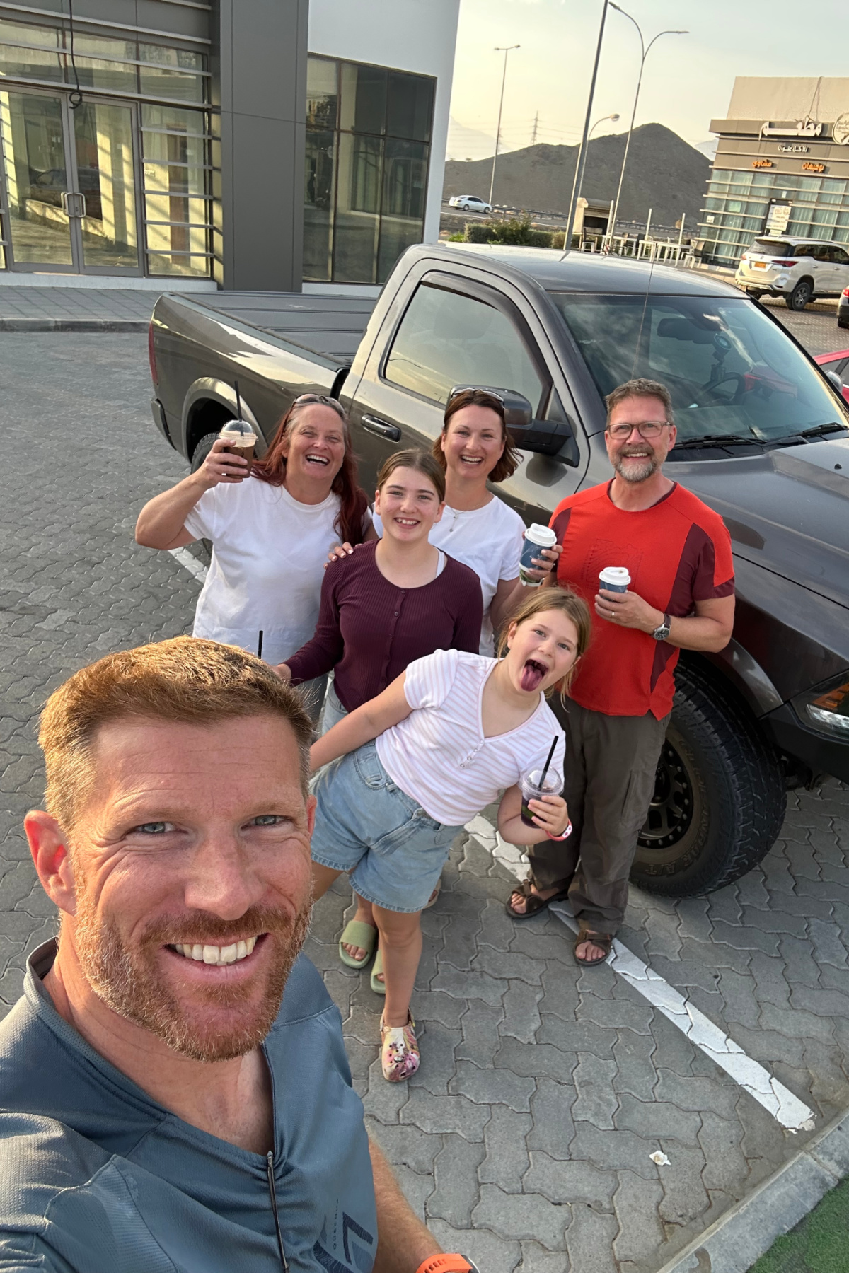 Us and our friends having coffee after our Wahiba Sands desert crossing