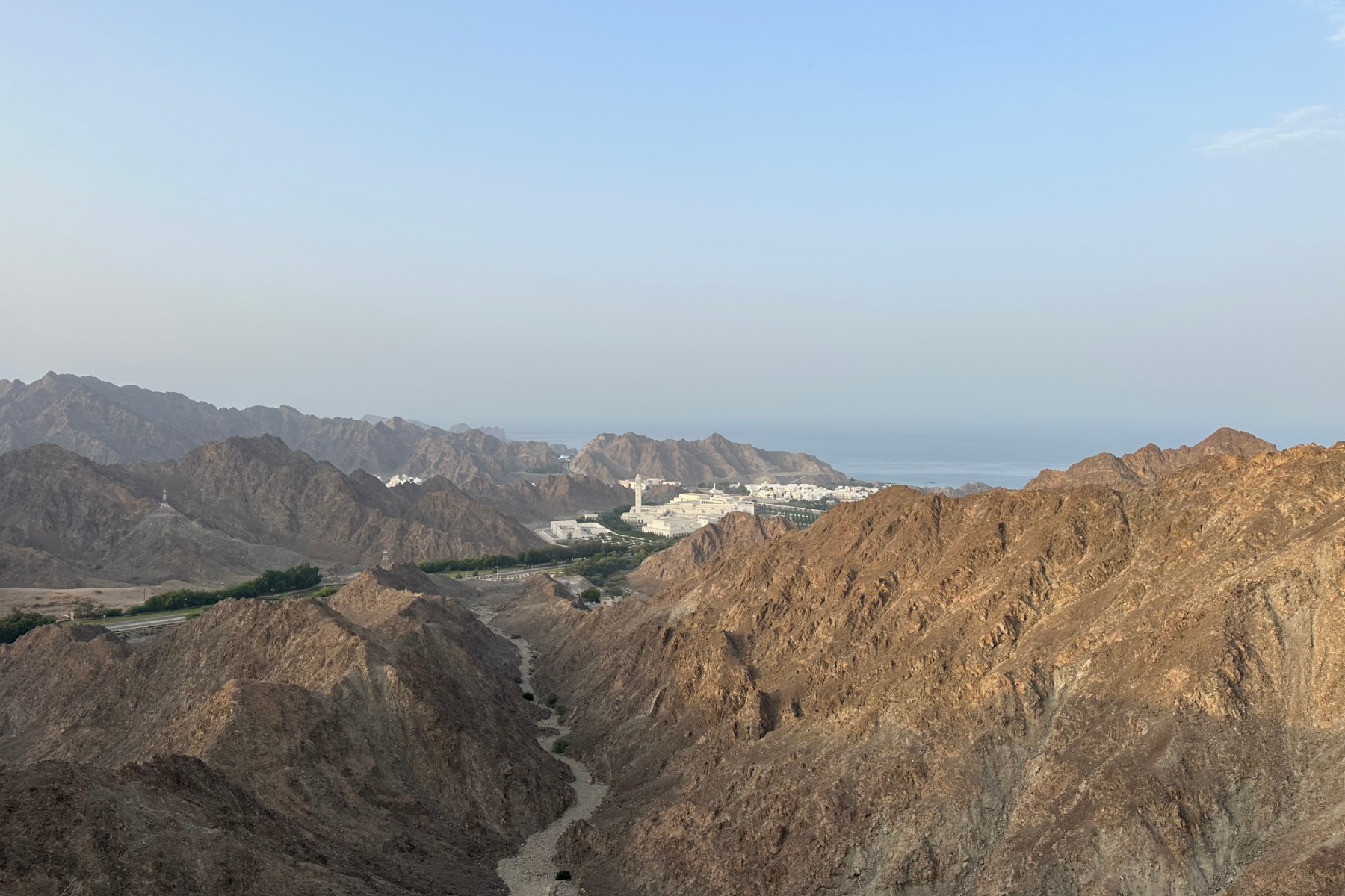 A view of the Oman Parliament area, mountains about Muttrah and the coast from the Al Bustan view point