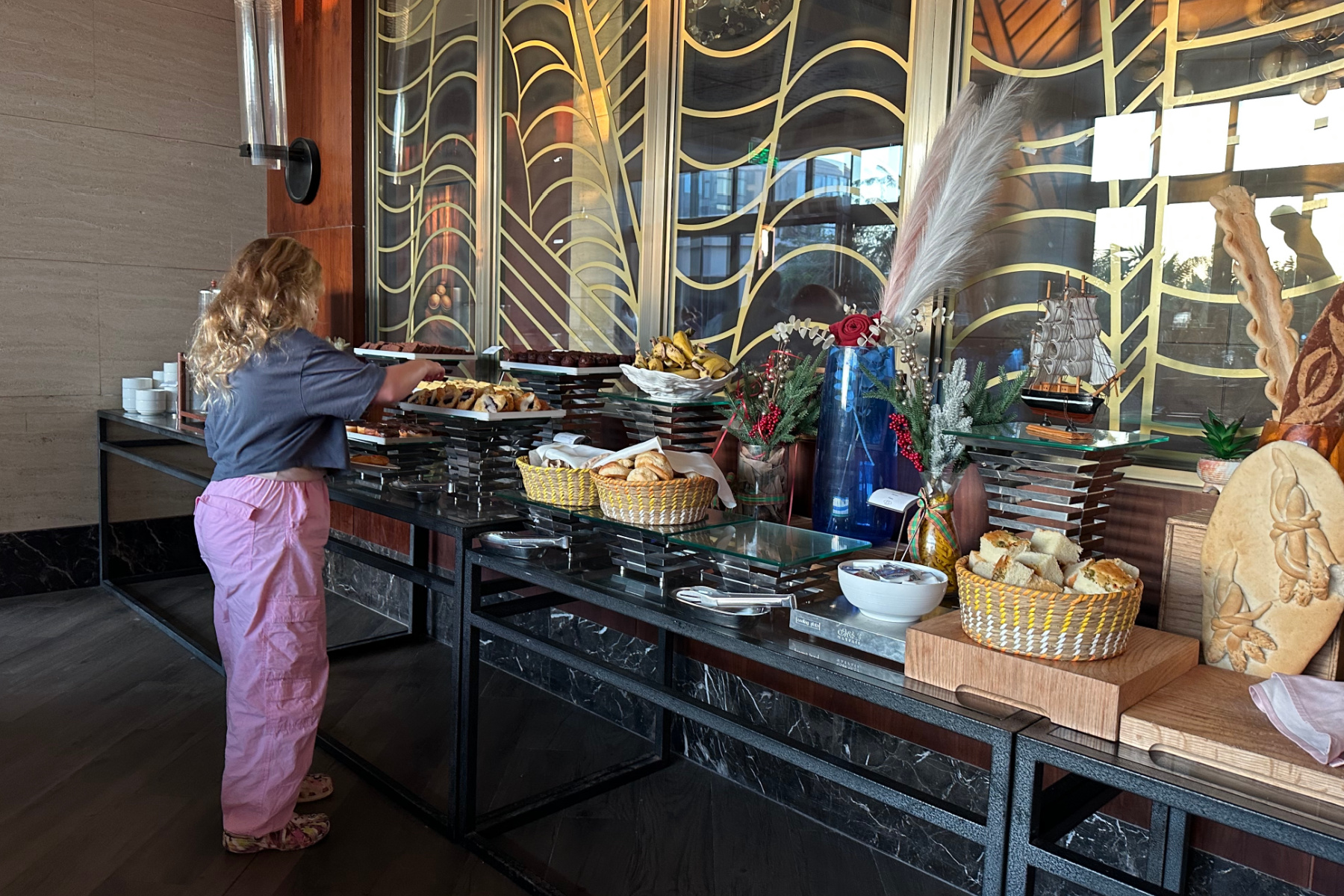 My daughter getting breakfast at the buffet in the main restaurant