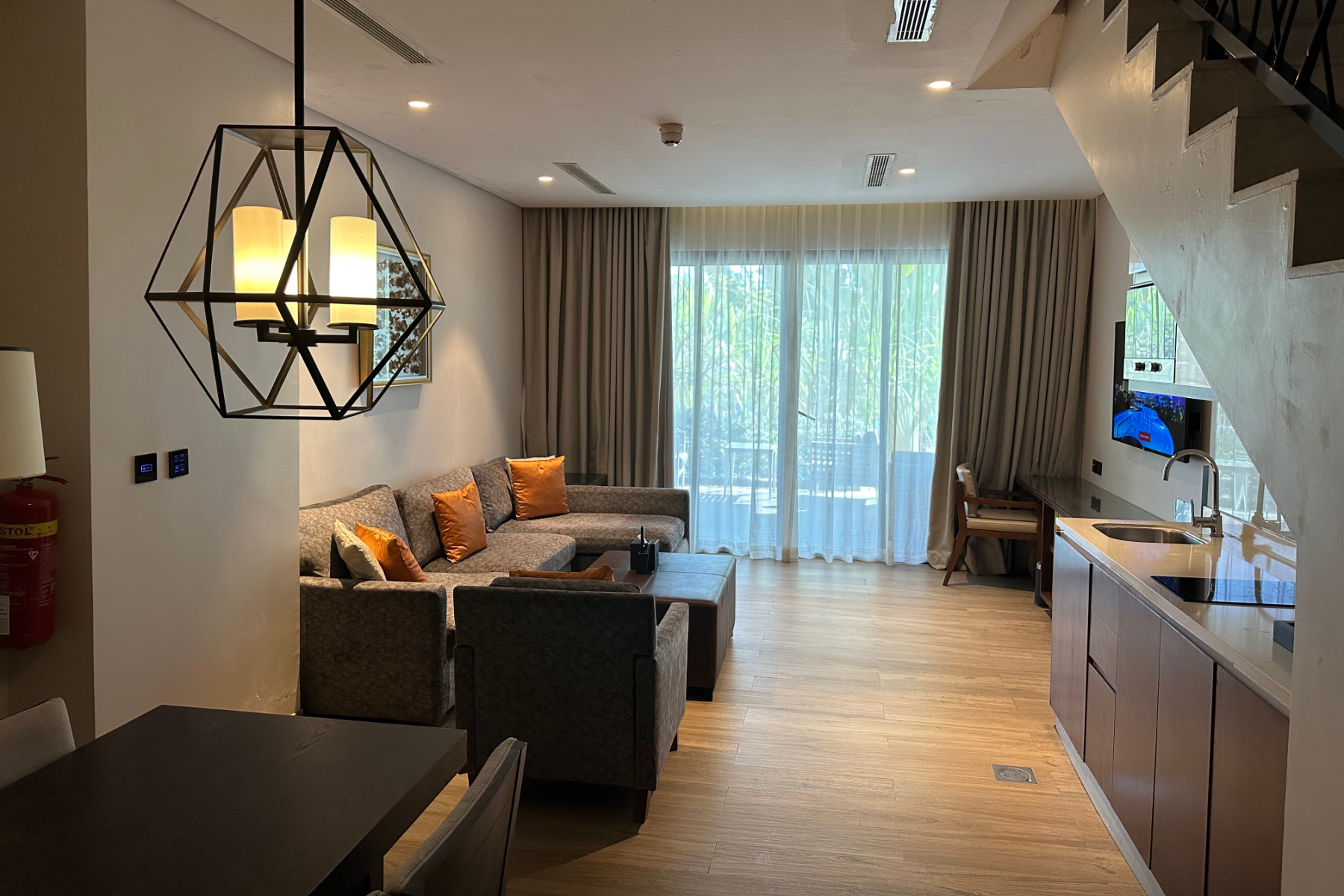 A long view of the dining and sitting area in our two bedroom villa