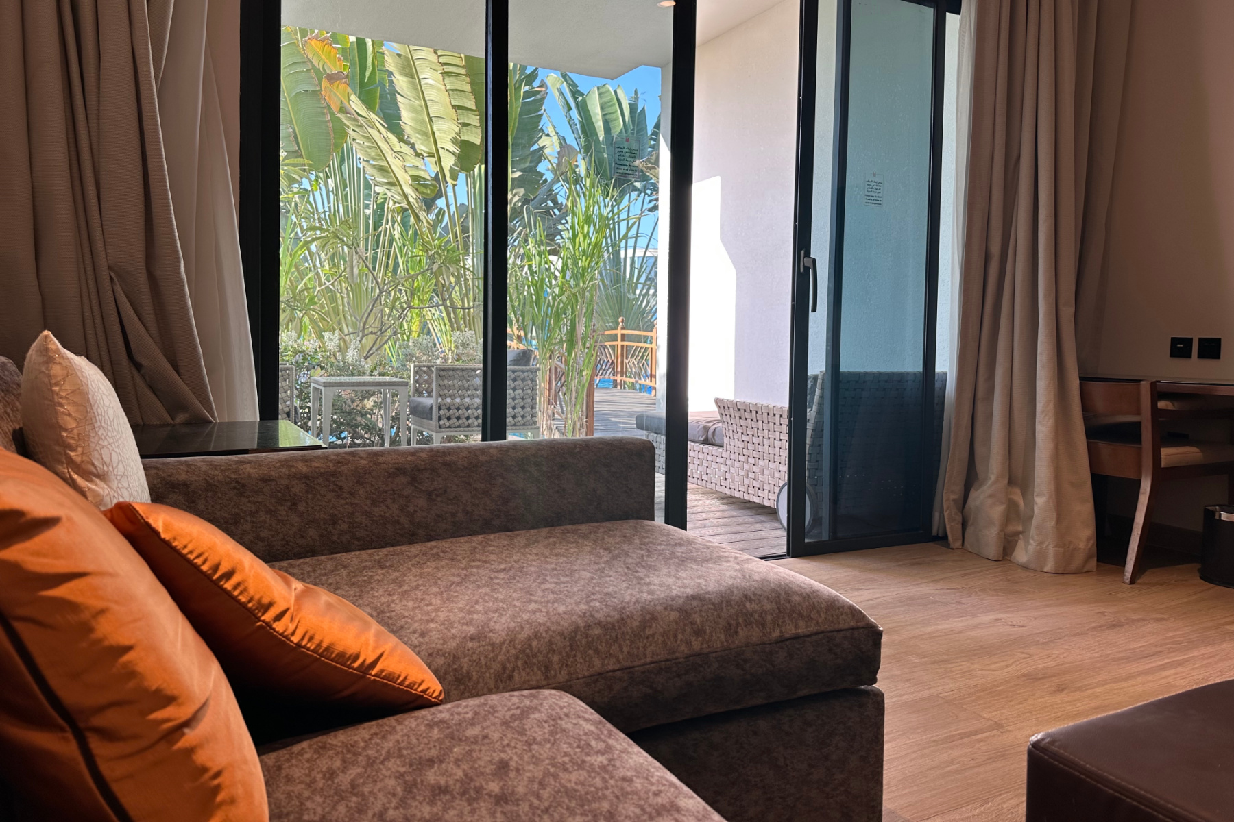 A view of our covered decking area from the sofa inside