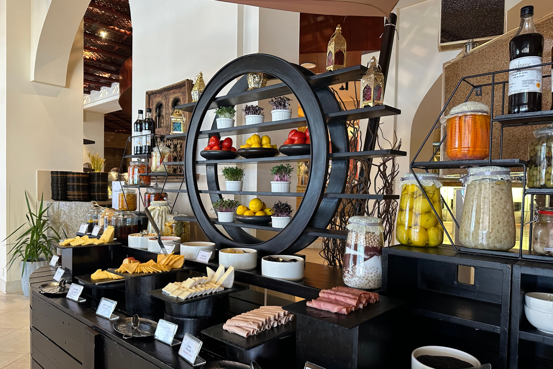Cheeses, meats and salads displayed in the Al Tanoor Buffet Restaurant