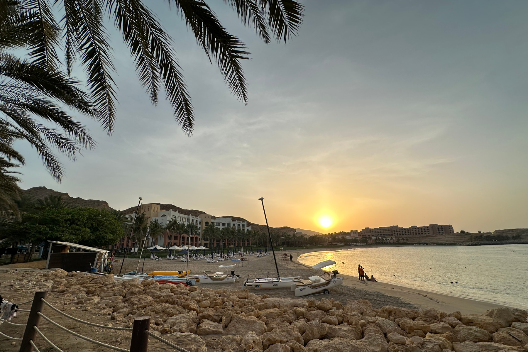 The sun setting over the Al Husn end of the Hilton Al Bandar Resort
