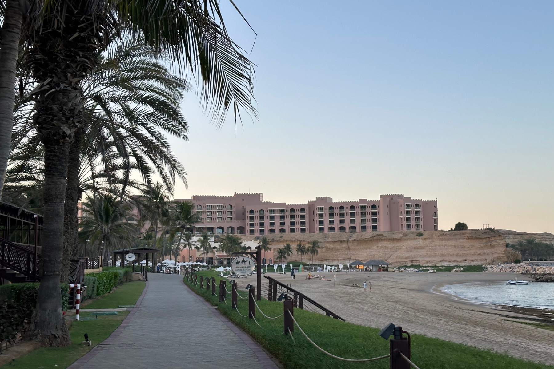 The path along the front of the Hilton Muscat Al Bandar resort 