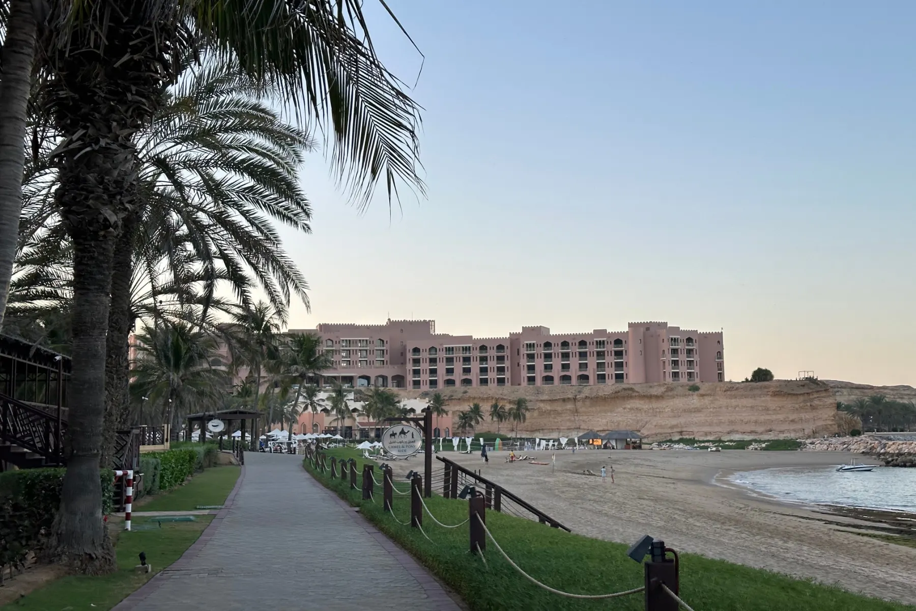 The path along the front of the Hilton Muscat Al Bandar resort 