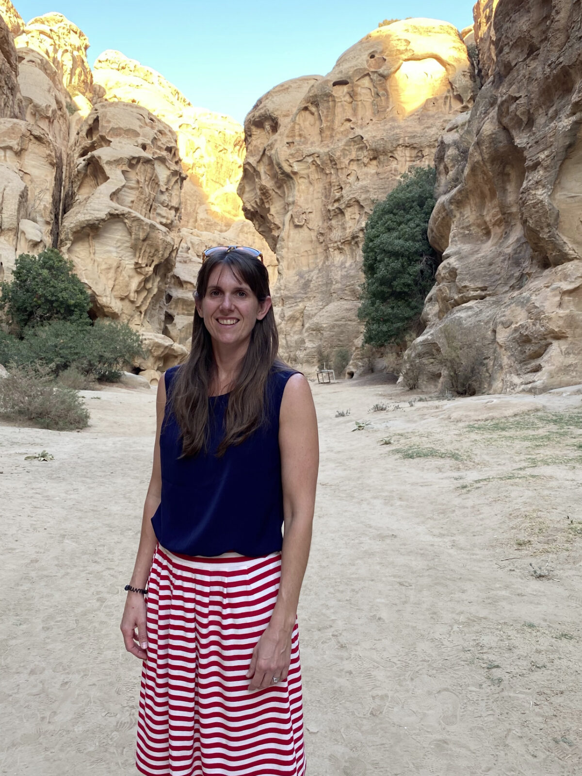 Laura Dean, Owner of Little People Big Adventures, in a valley