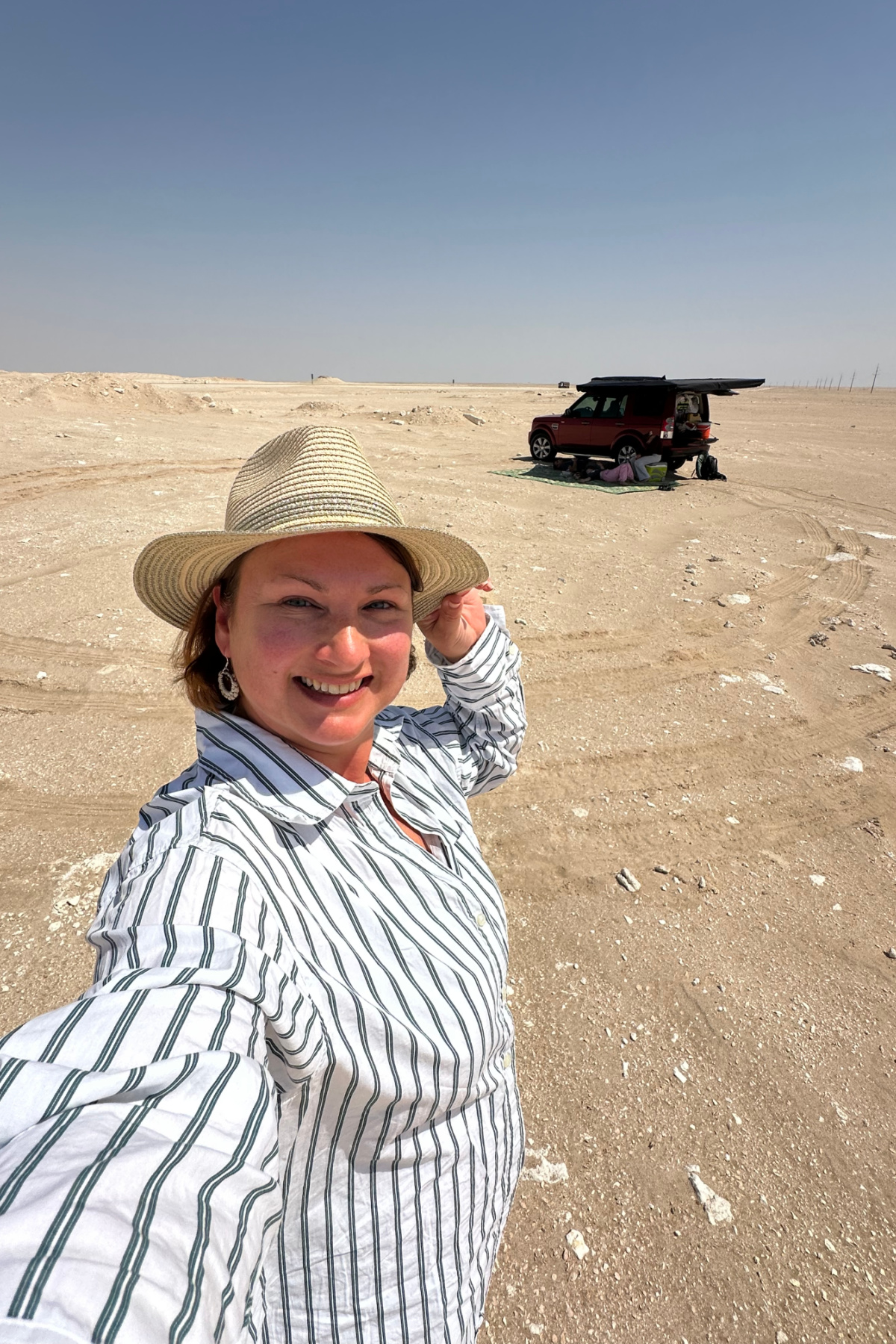 Me stood in the middle of nowhere on Route 31 from Salalah to Muscat. Our car is in the background