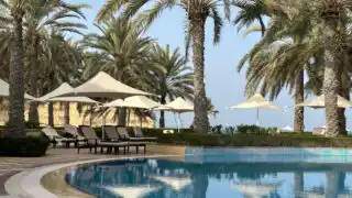 View across the pool at Hilton Al Bander in Muscat