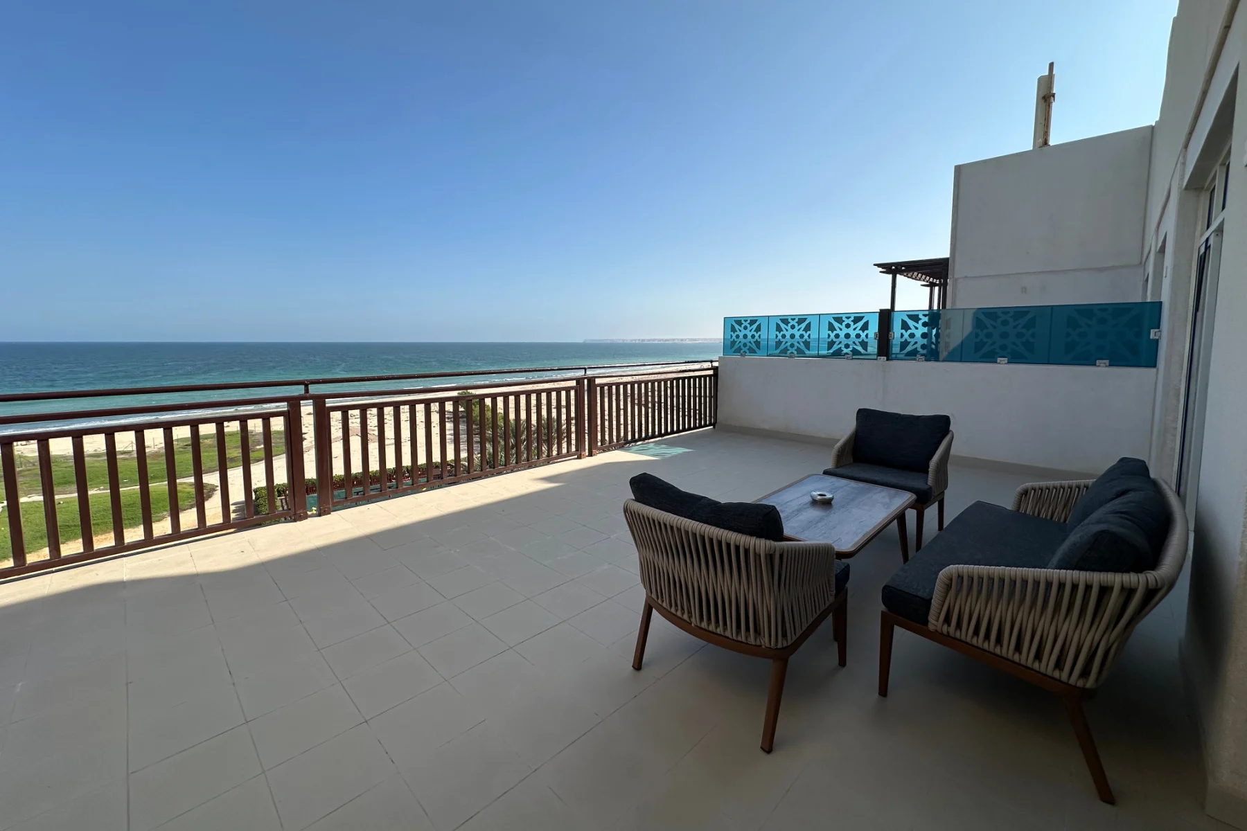 A view from the roof terrace of our Crowne Plaza Duqm executive suite across towards the public beach and sea