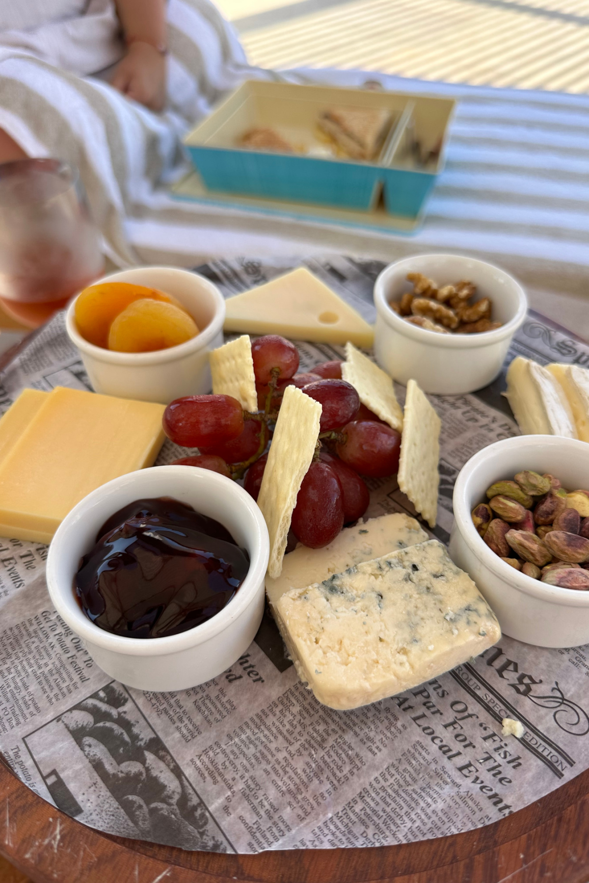 A plate of cheese and pickles