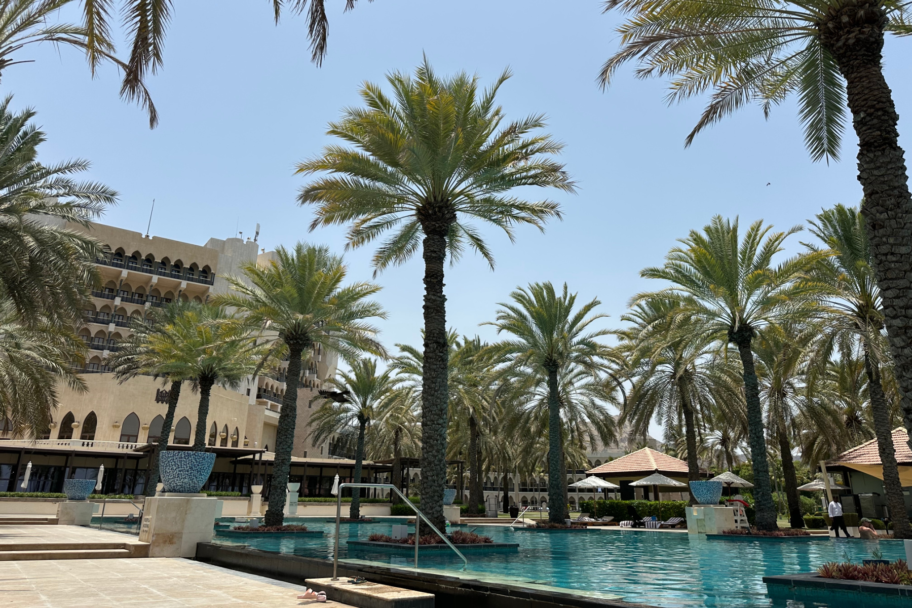 The Al Bustan Palace Ritz Charlton hotel in Muscat viewed from the infinity pool