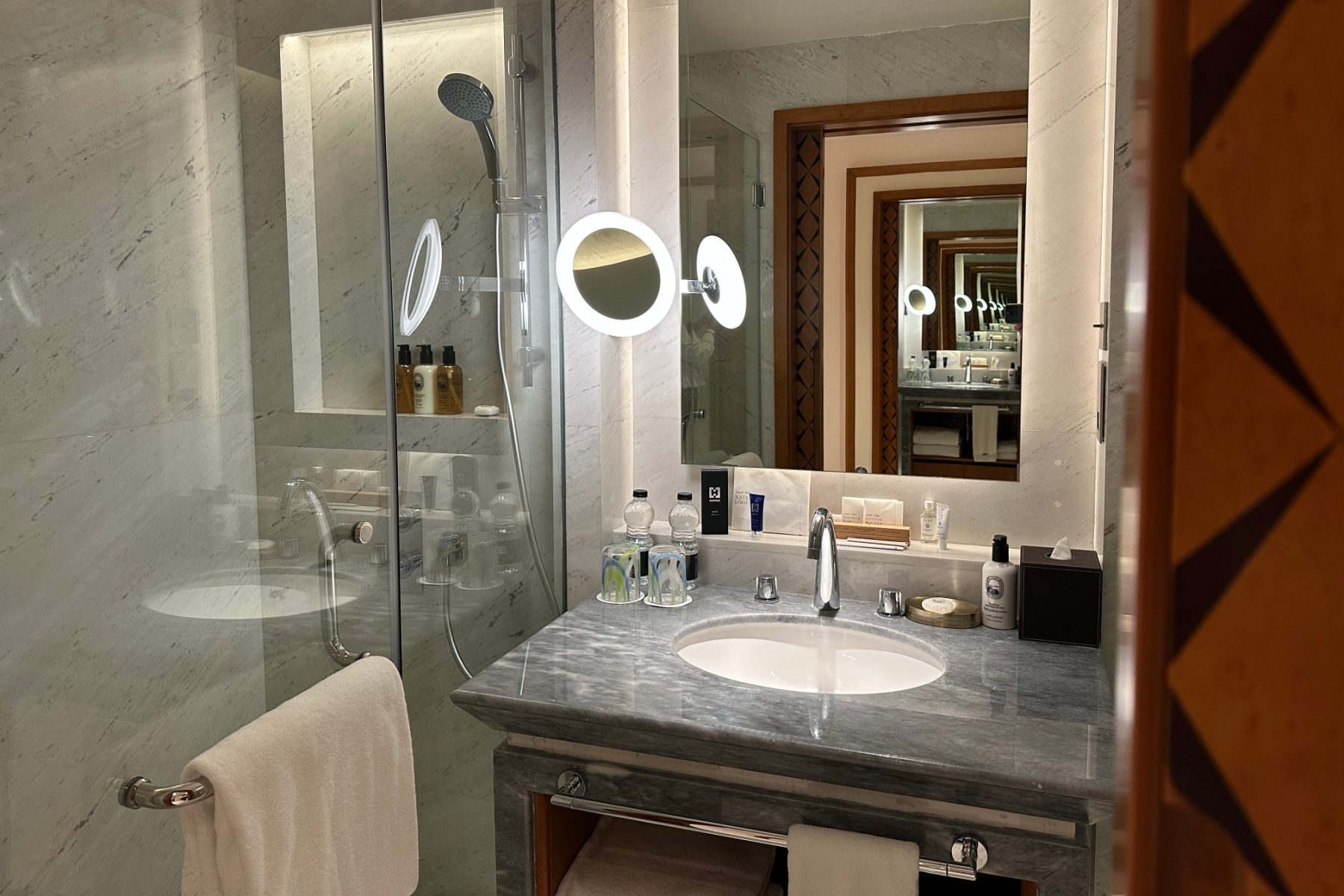 The ensuite bathroom with shower in the twin room in the Sohar Presidential Suite at Al Bustan Palace