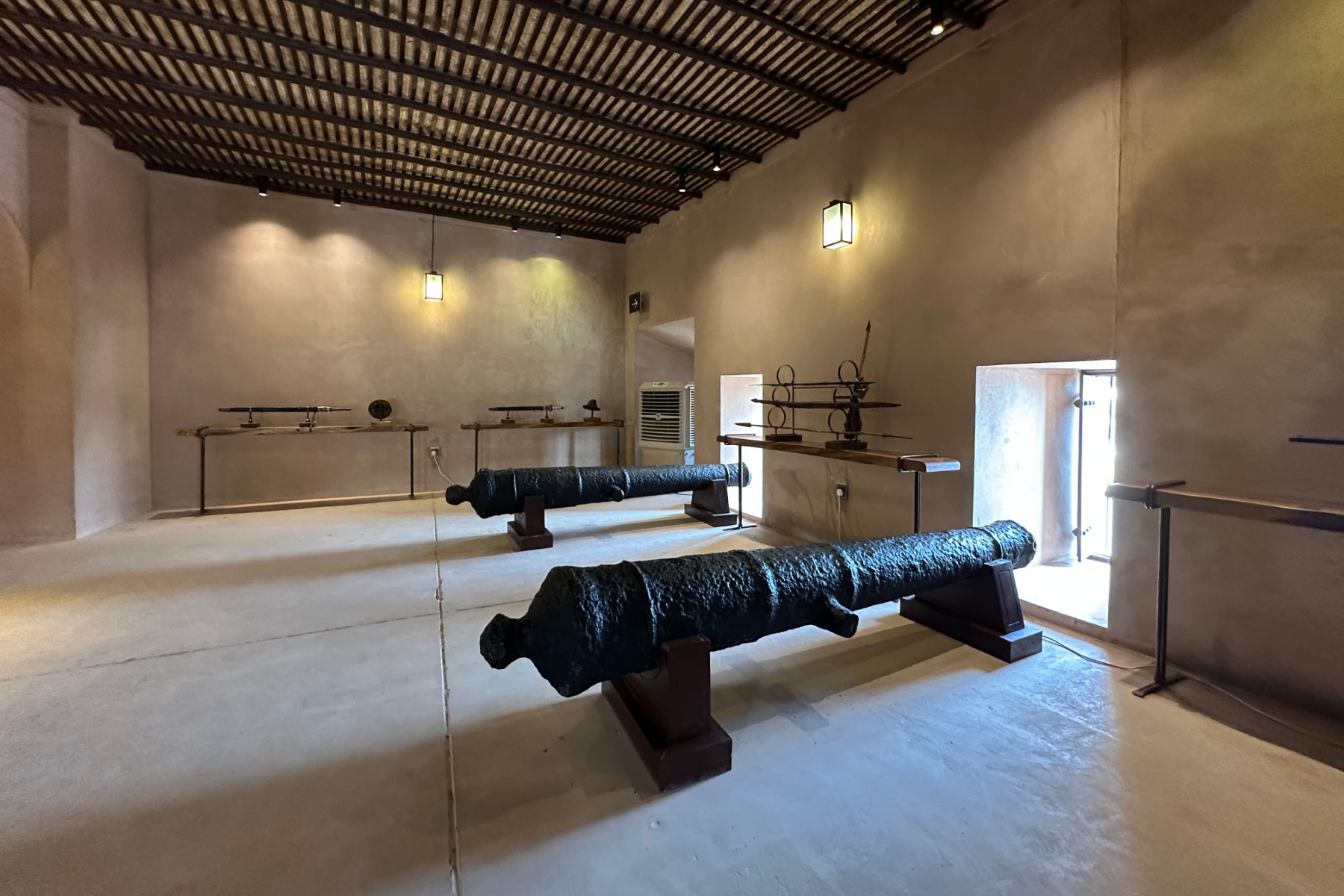 Cannons and swords on display in Al Mirani Fort in Muscat